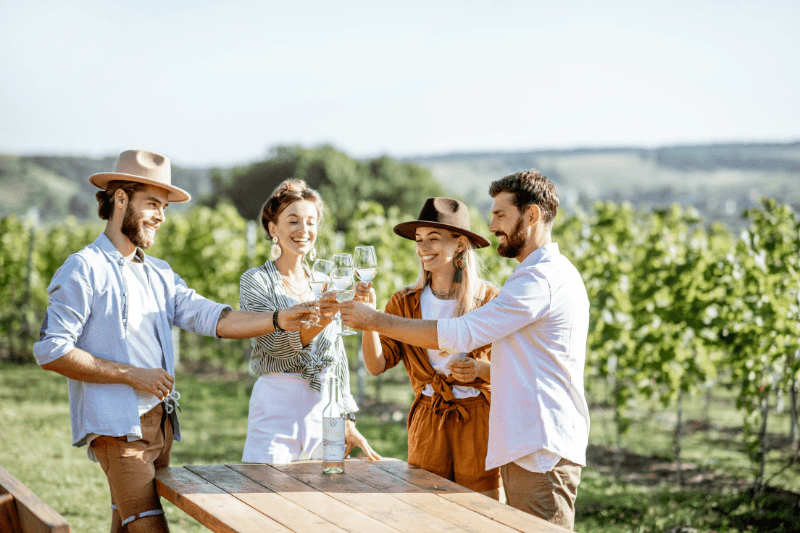 https://www.californiachampagnesabers.com/wp-content/uploads/2026/05/Friends-raising-Champagne-glasses-during-an-outdoor-vineyard-tasting.png